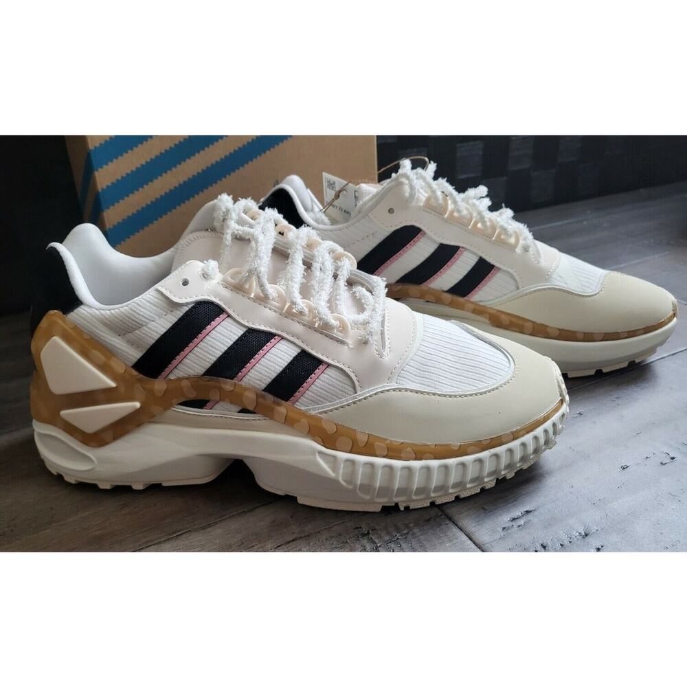 adidas Disney White Black Pink Women’s Athletic Sneakers with Tan Accents.